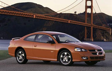 AFbeelding van een oranje Dodge Stratus