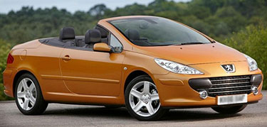 Een oranje Peugeot 307