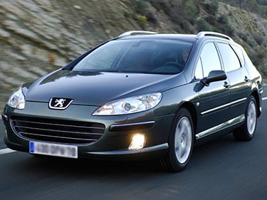 Dit is een foto van een zwarte Peugeot 407